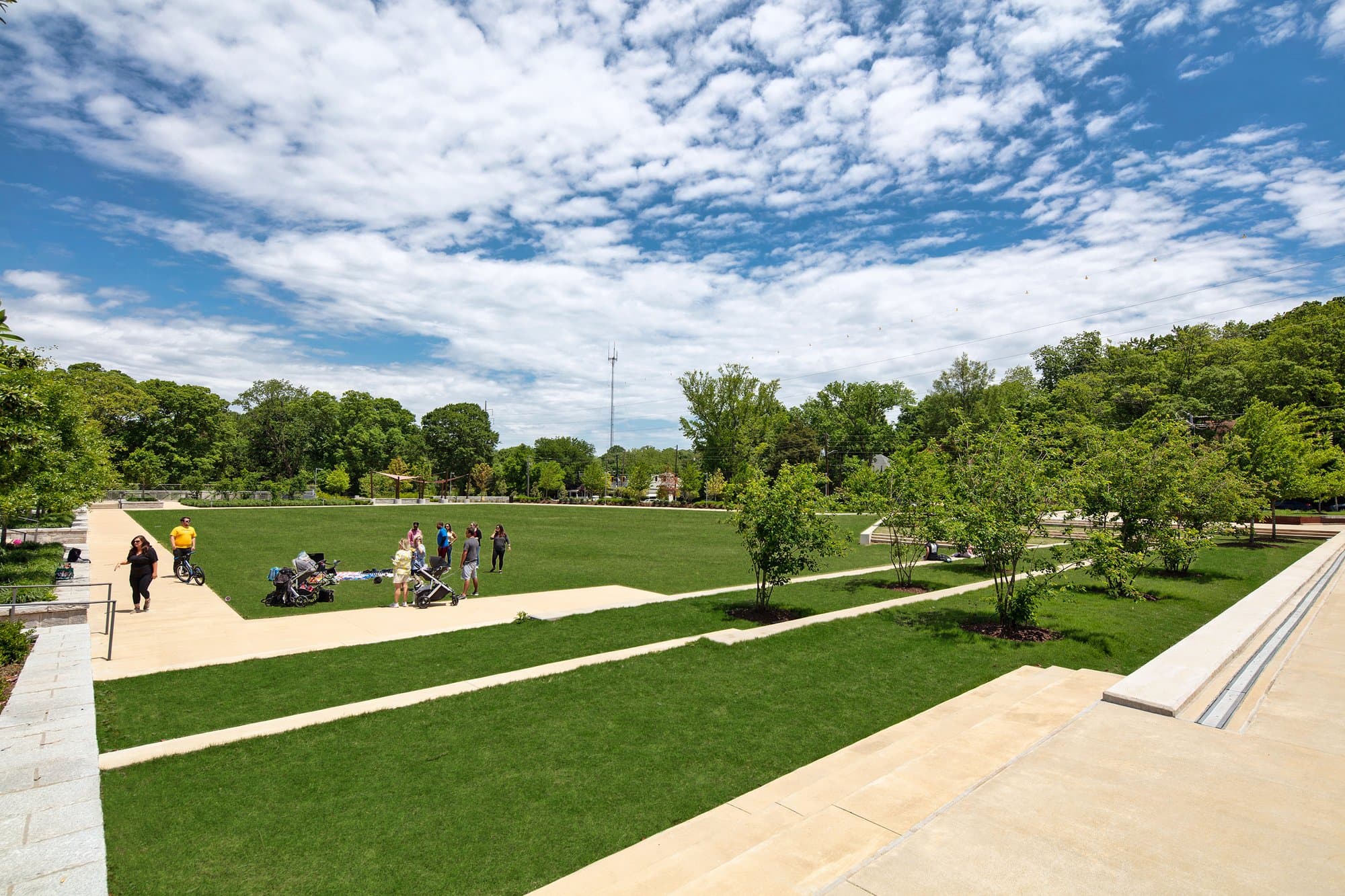 Rendering of grassy park area above parking deck.